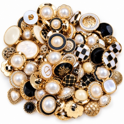 Fancy Gold Grab Bag – Assorted Decorative Sewing Buttons Assorted fancy gold sewing buttons with pearl-look centers, black accents and ornate designs