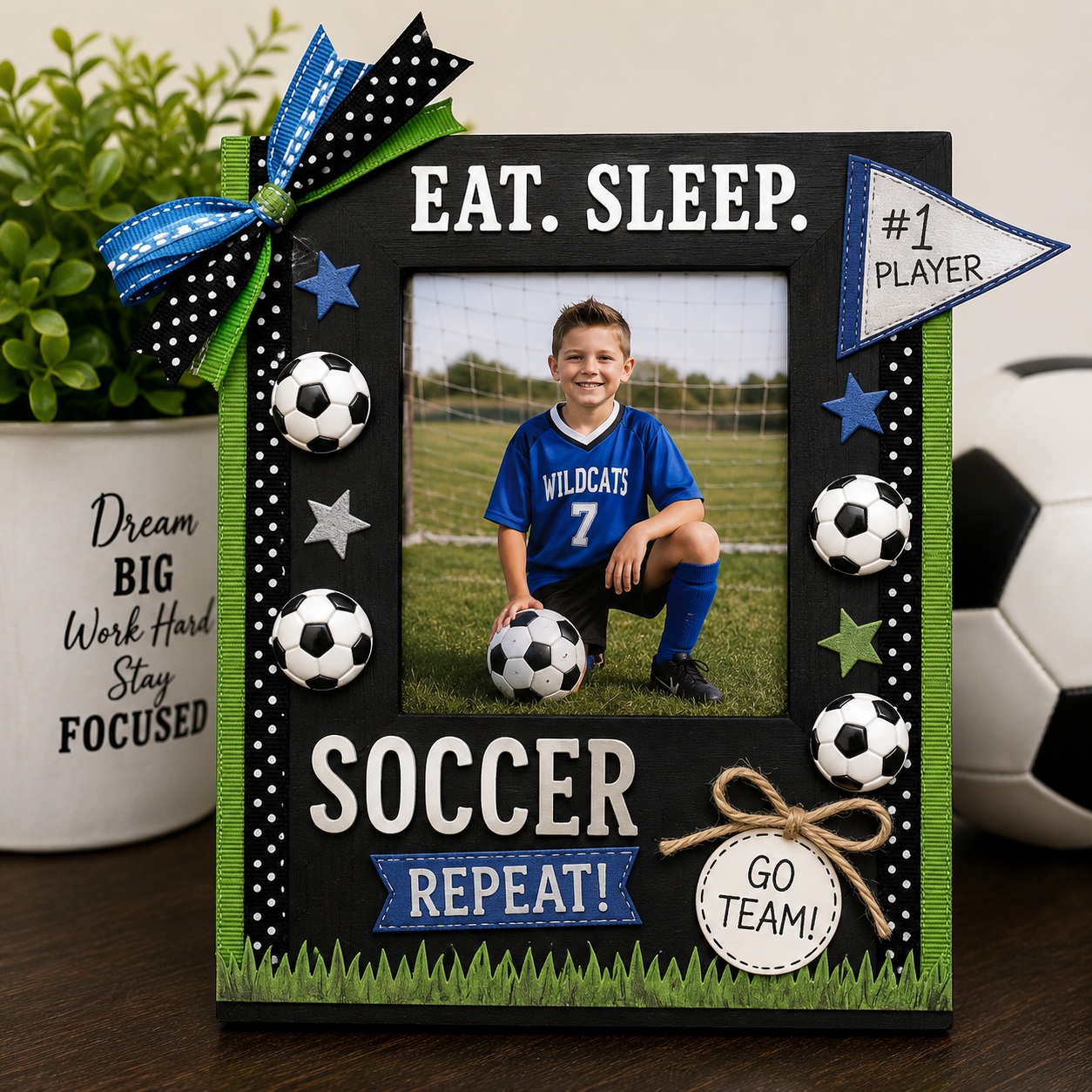 soccer-ball-craft-button-set-finished-picture-frame Handmade soccer-themed picture frame decorated with Soccer Ball Craft Buttons, perfect for displaying team photos, player keepsakes, coach gifts, and sports room décor
