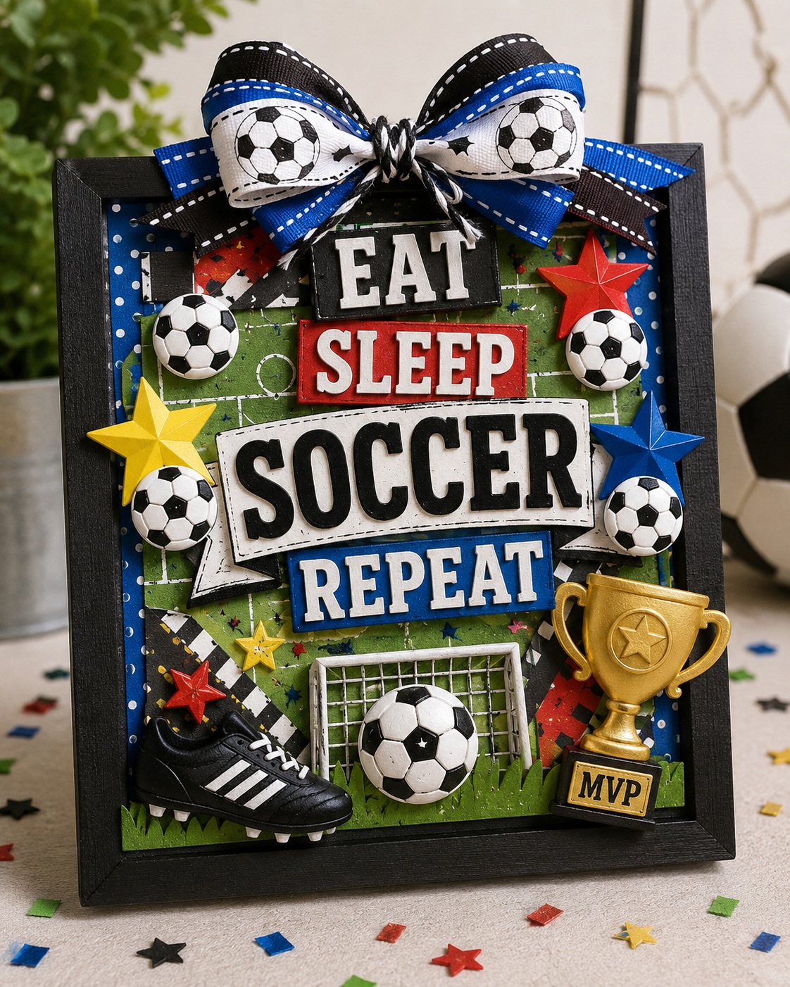 soccer-eat-sleep-repeat-shadow-box-craft Handmade soccer-themed shadow box decorated with soccer ball and colorful star craft buttons featuring the phrase "Eat Sleep Soccer Repeat," perfect for team gifts, coach appreciation, sports room décor, and DIY soccer crafts