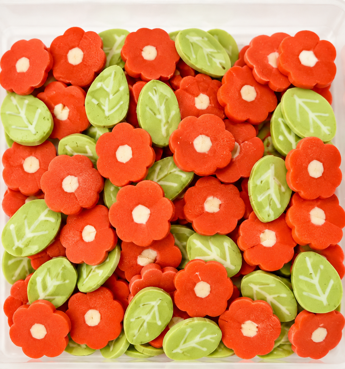 orange-flower-green-leaf-craft-sprinkles-mix.jpg Orange flower and green leaf polymer clay craft sprinkles mix