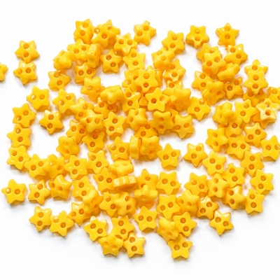 Itty bitty yellow star buttons for quilting doll clothes and sewing crafts