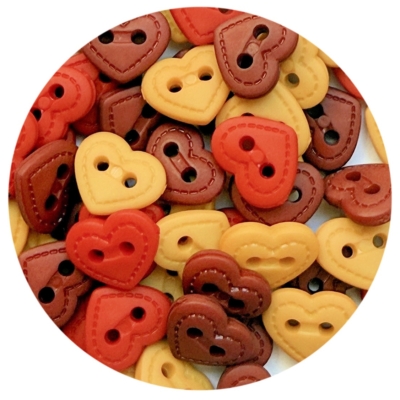 Quilt heart buttons in an autumn palette with warm red, orange, brown, and gold tones for sewing, scrapbooking, and fall crafts