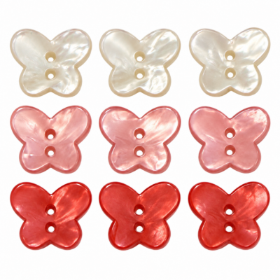 Nine pearl butterfly buttons in red, pink and white for sewing and crafts